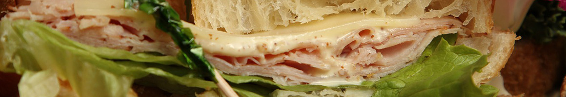 Eating Deli Sandwich at Hickory Tree Delicatessen restaurant in Chatham, NJ.